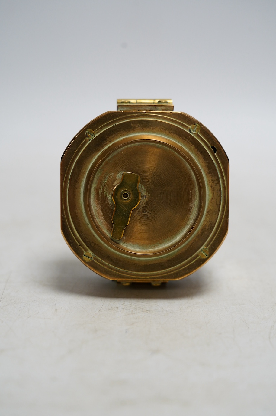 A Stanley brass cased compass with internal spirit level, and a panel with engraved Natural Sine table applied to the lid. Condition - good